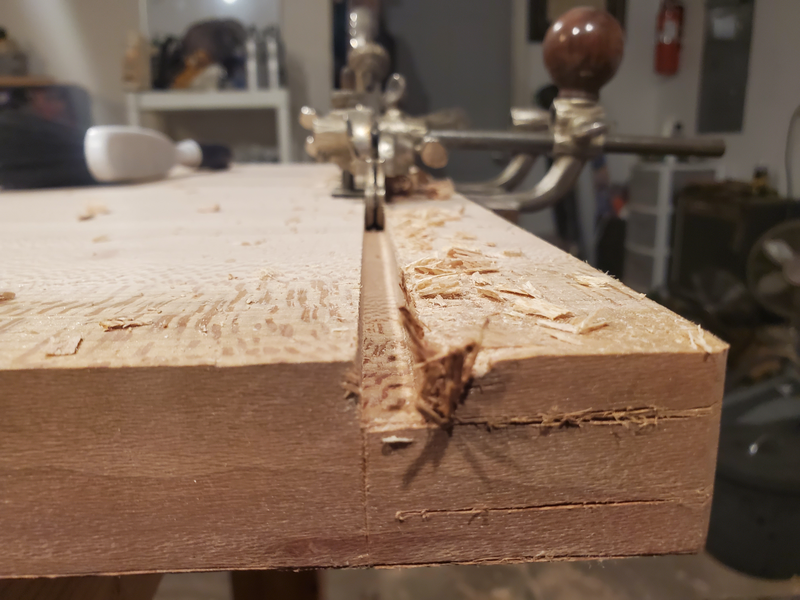 Number 45 plane cutting a cross grain groove